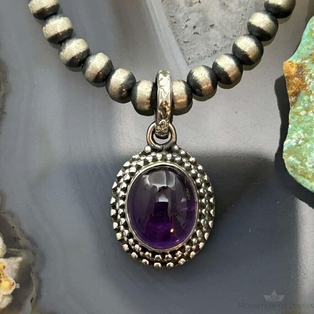 Sterling Southwestern Style Oval Amethyst Decorated Charm/Pendant For Women